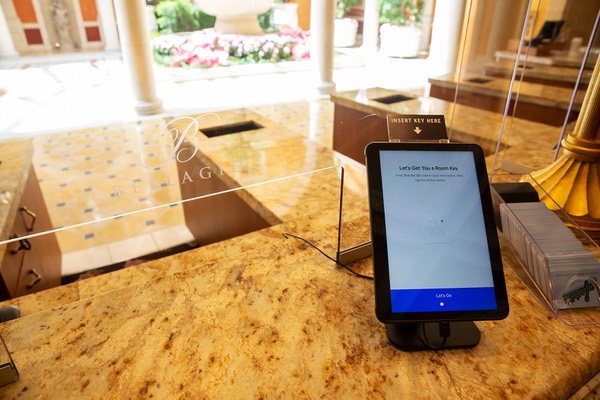 An early prototype of the app mounted on a check-in counter of in the Bellagio.